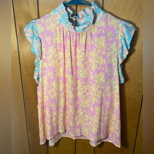 Karlie top, size large. Lightweight. Multicolored, button detail on the back.